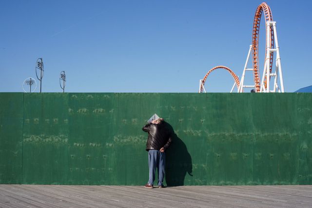 A photo of a man at a construction site in Coney Island